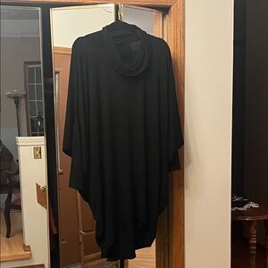 Elegant Black Poncho style top.